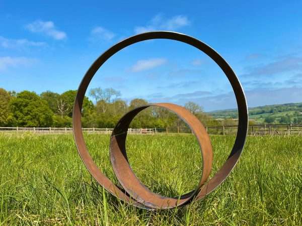 WELCOME TO THE RUSTIC GARDEN ART SHOP Here we have one of our. Garden Metal Ring Sculpture Sizes & Measurements:
52cm x 52cm
Ring:
9cm width x 3mm thick Perfect For Any Garden Or Outdoor Space.
All of our garden stake art come with garden stakes affixed or prongs enabling a quick & easy install!