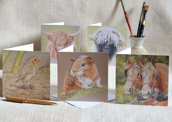 Animal Art Greetings Card Pack. Five cards one each of highland cow, valnais sheep, robin, guinea pig and pair horses in harness