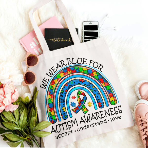 We wear blue for autism tote bag