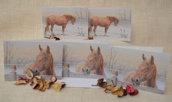 Five blank art cards. Suffolk Punch horses in a snowy paddock greeting either a pair of white geese or a robin. Card size approximately 6 x 4 inches with envelopes. From coloured pencil art.